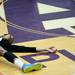 Pioneer senior Tevis Robinson stretches at center court before the game against Saline on Friday, Feb. 1. Daniel Brenner I AnnArbor.com